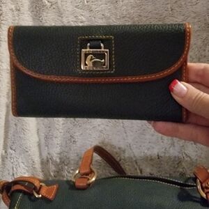 Dooney and Bourke green leather wallet.